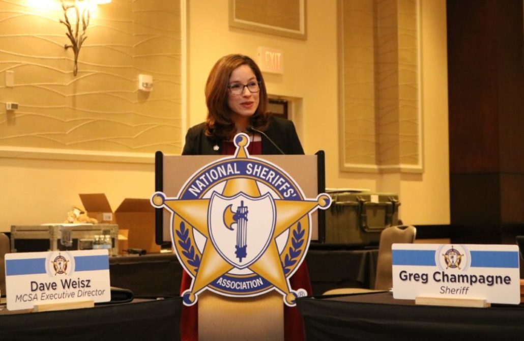 Pictured: FEB 2018 - BCR’s Jennifer Leon addressing members of the National Sheriffs’ Association in Washington, DC. Photo courtesy of Daniel J. Galbraith.